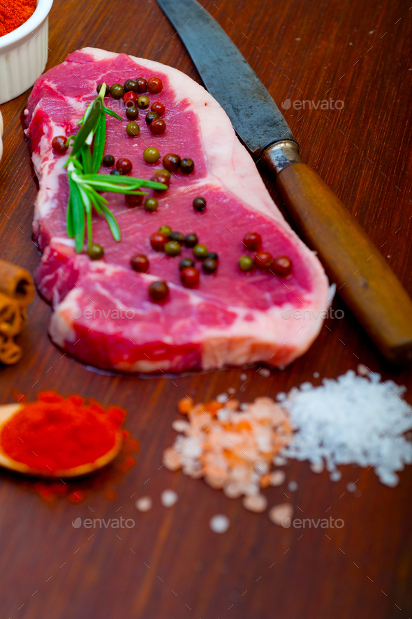 raw uncooked ribeye beef steak butcher selection Stock Photo by keko64
